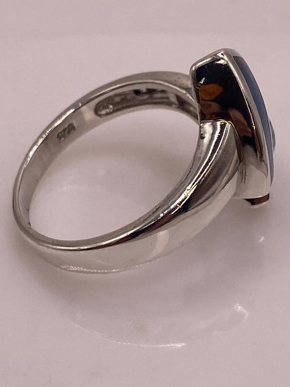 Anillo Artístico Asimétrico con Ópalo de Fuego y Zirconia en Plata .925, sello de autenticidad Plata Ley .925