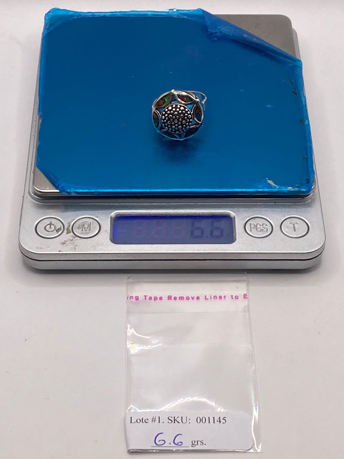 Anillo Artístico Circular con Ópalo de Fuego en Plata .950, peso en gramos (báscula)