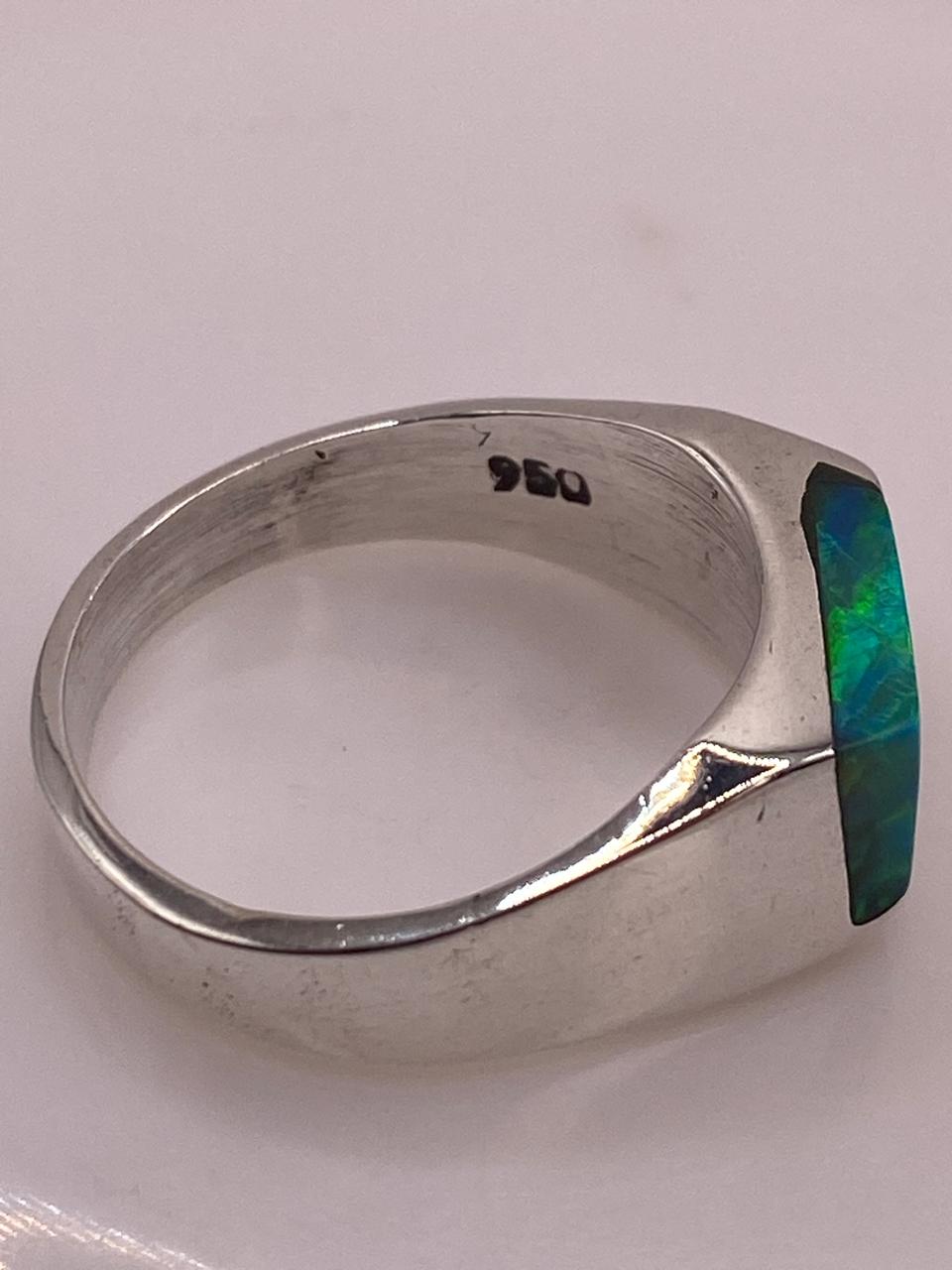 Anillo Asimétrico de Plata 950 con Ópalo de Fuego, sello de autenticidad Plata Ley .925