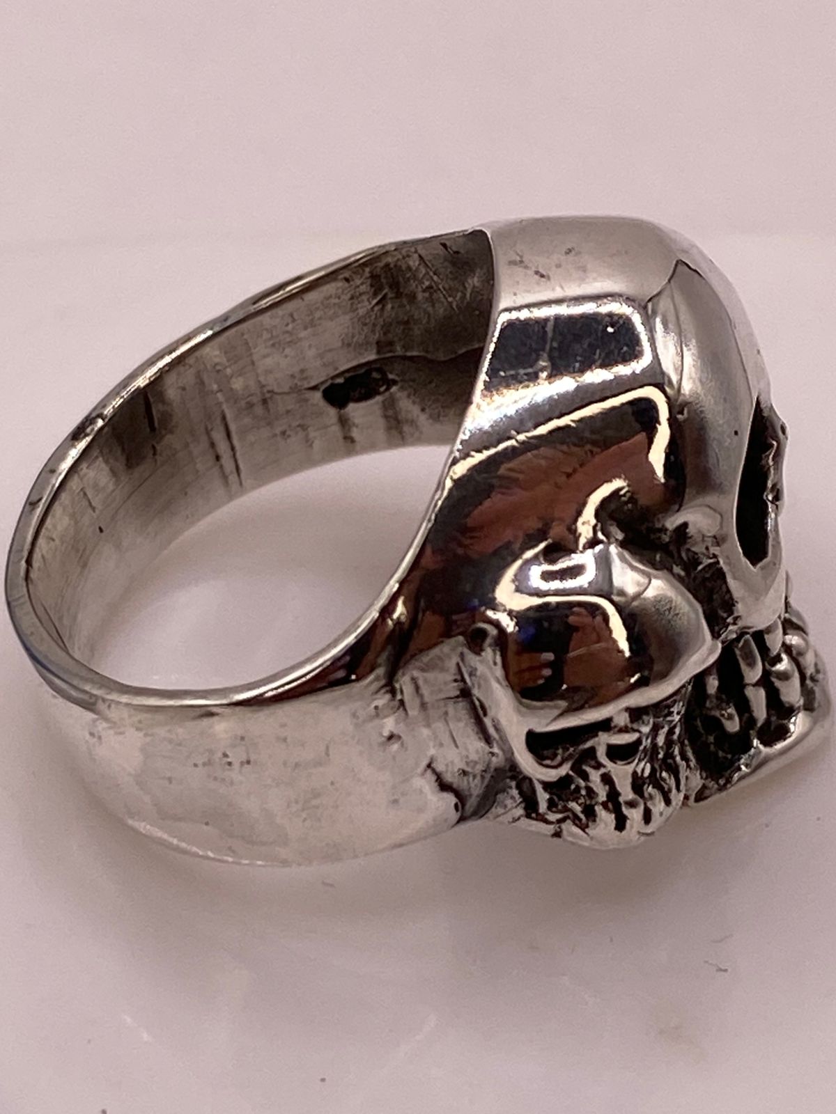 Anillo de Calavera Triple en Plata .950, sello de autenticidad Plata Ley .925