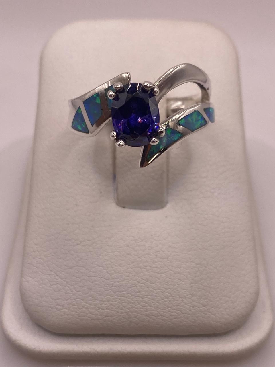 Anillo Contemporáneo Abierto con Ópalo de Fuego y Zirconia en Plata .950 — detalle de acabado