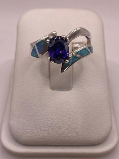 Anillo Contemporáneo Abierto con Ópalo de Fuego y Zirconia en Plata .950 — detalle de acabado