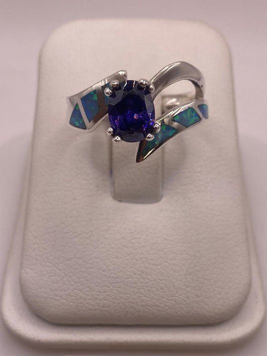 Anillo Contemporáneo Abierto con Ópalo de Fuego y Zirconia en Plata .950 — detalle de acabado