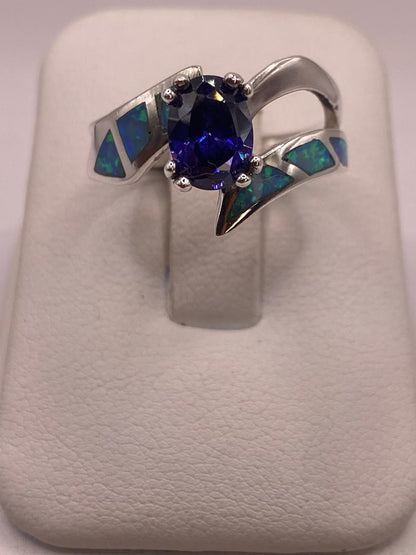 Anillo Contemporáneo Abierto con Ópalo de Fuego y Zirconia en Plata .950, vista superior