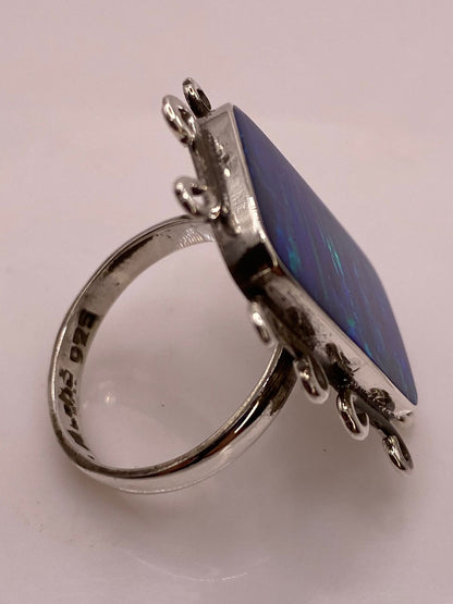 Anillo Contemporáneo Ajustable con Ópalo de Fuego Azul y Verde en Plata .925, sello de autenticidad Plata Ley .925