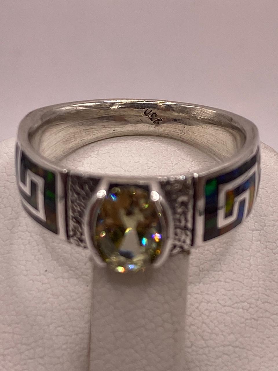 Anillo Contemporáneo Asimétrico con Ópalo de Fuego y Zirconia en Plata .950, sello de autenticidad Plata Ley .925