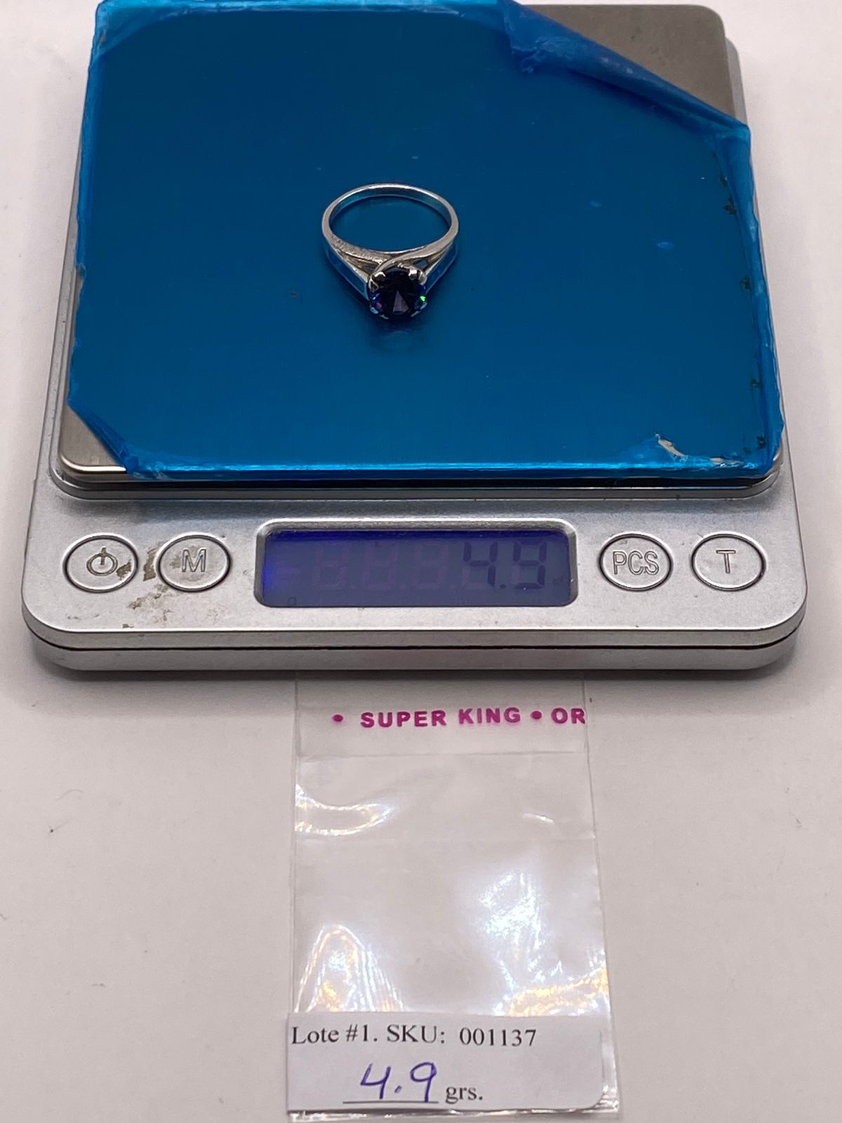 Anillo Contemporáneo con Ópalo de Fuego y Zirconia Azul en Plata .950, peso en gramos (báscula)