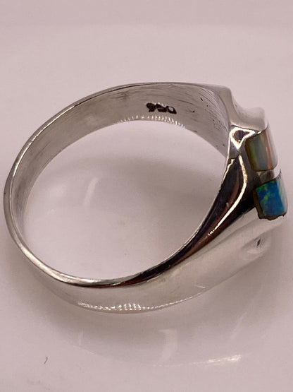 Anillo Contemporáneo en Plata Ley 950 con Ópalo de Fuego Multicolor, sello de autenticidad Plata Ley .925