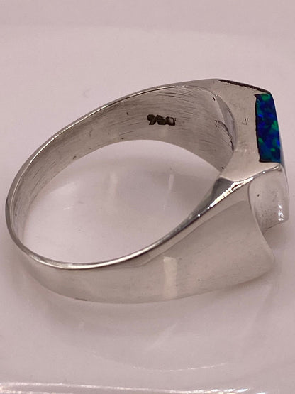 Anillo Contemporáneo Plata Ley 950 con Ópalo de Fuego, sello de autenticidad Plata Ley .925
