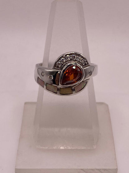 Anillo Diseño Curvo de Plata 925 con Ópalo de Fuego y Zirconia, vista lateral