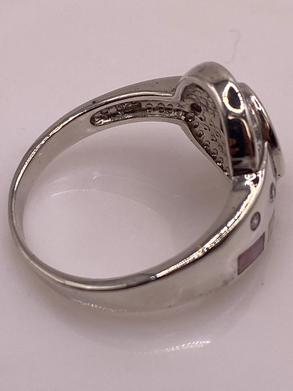 Anillo Diseño Curvo de Plata 925 con Ópalo de Fuego y Zirconia, sello de autenticidad Plata Ley .925