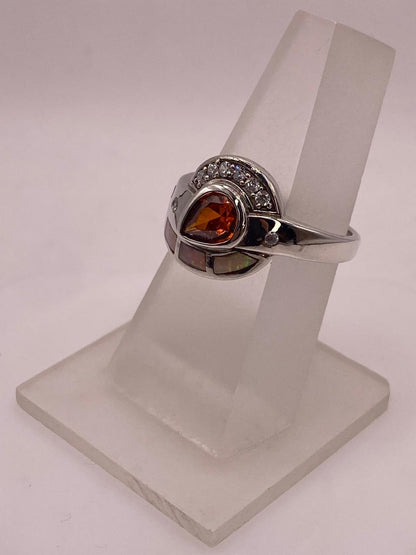 Anillo Diseño Curvo de Plata 925 con Ópalo de Fuego y Zirconia, vista frontal