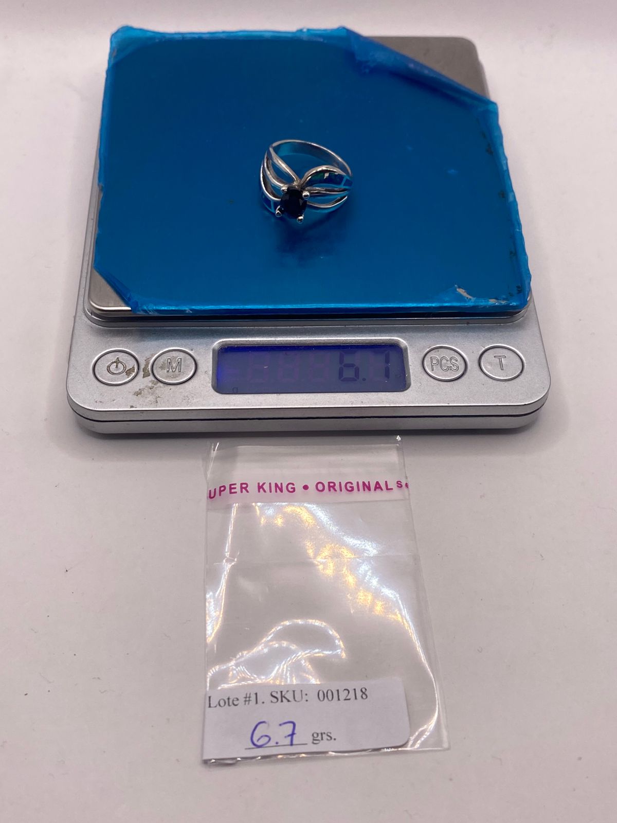 Anillo Elegante Curvo de Plata 950 con Ópalo de Fuego y Zirconia, peso en gramos (báscula)
