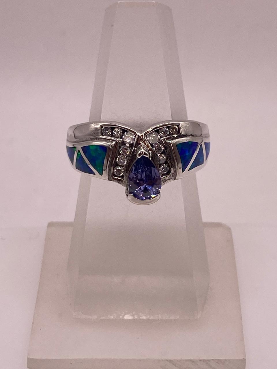Anillo Elegante de Plata 925 con Ópalo de Fuego y Zirconia, vista lateral