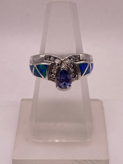 Anillo Elegante de Plata 925 con Ópalo de Fuego y Zirconia, vista lateral