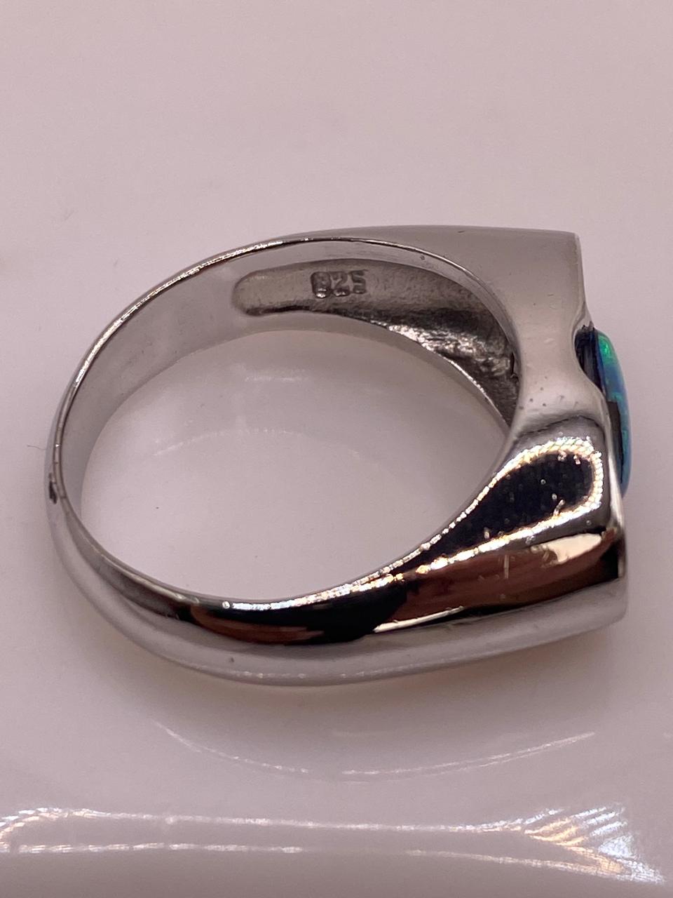 Anillo Elegante de Plata 925 con Ópalo de Fuego y Zirconia, sello de autenticidad Plata Ley .925