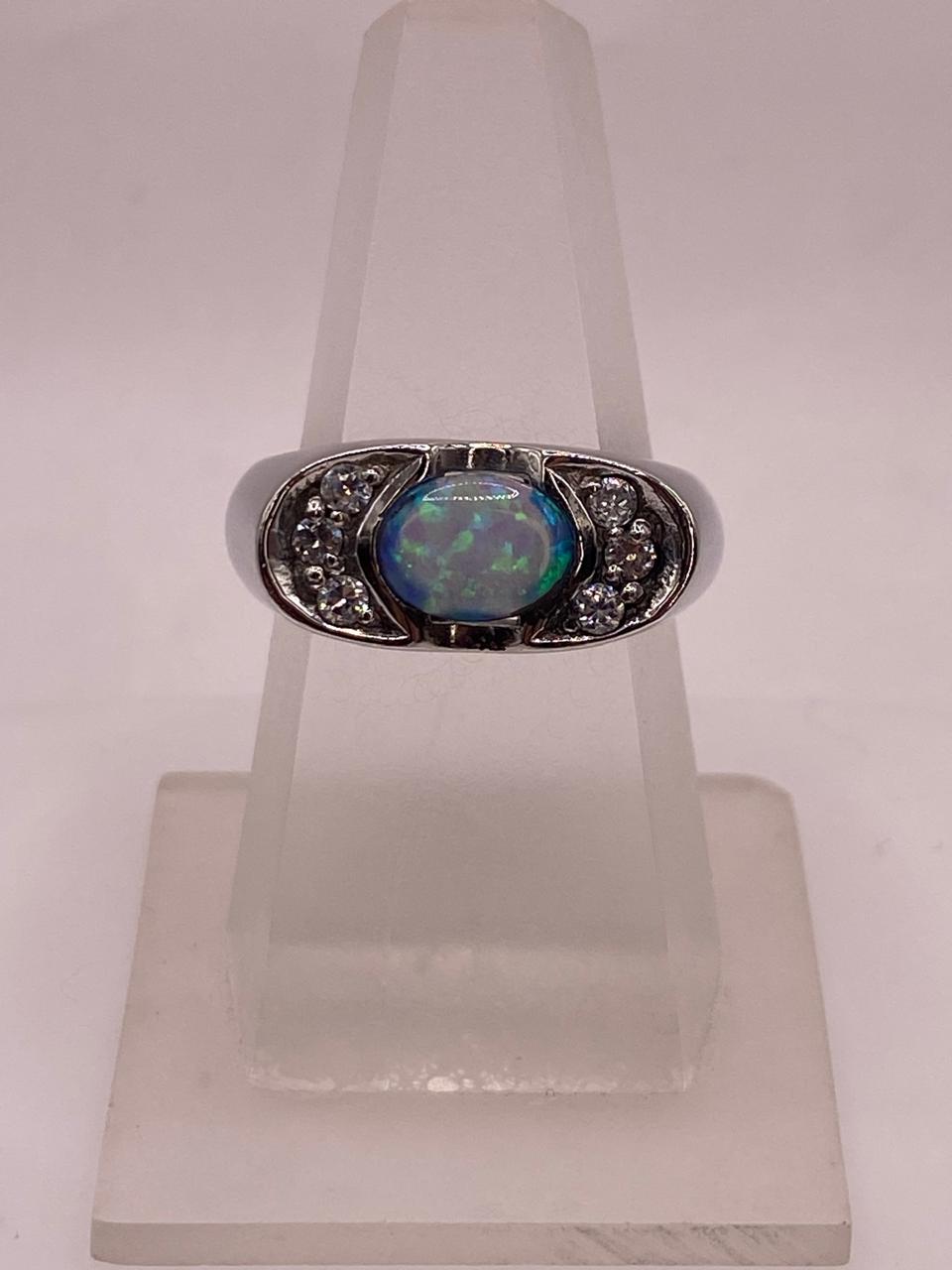 Anillo Elegante de Plata 925 con Ópalo de Fuego y Zirconia, vista lateral