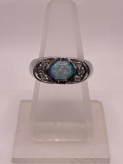 Anillo Elegante de Plata 925 con Ópalo de Fuego y Zirconia, vista lateral