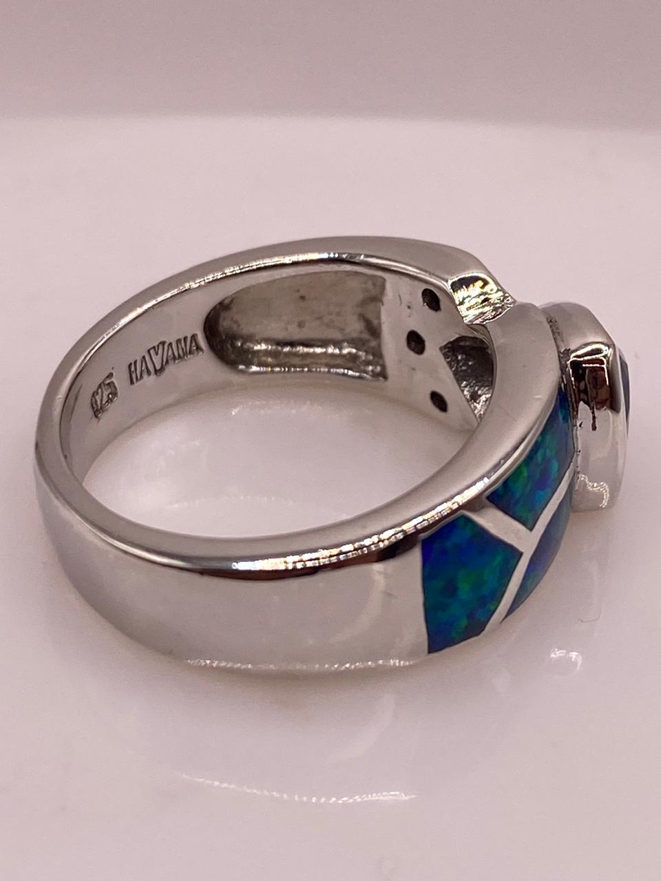 Anillo Elegante con Ópalo de Fuego Tornasol y Zirconia en Plata .925, sello de autenticidad Plata Ley .925