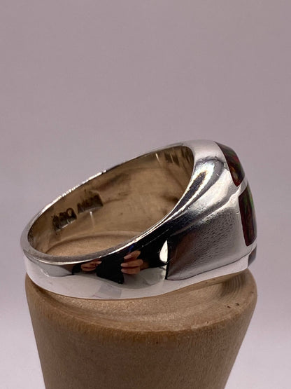 Anillo Escultural con Ópalo de Fuego Multicolor en Plata .950, sello de autenticidad Plata Ley .925