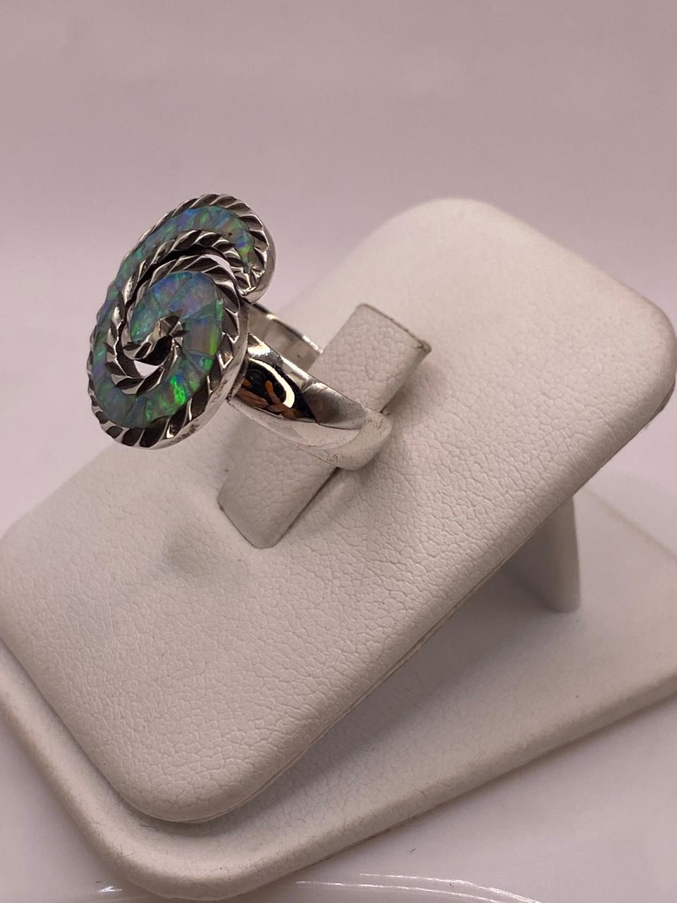 Anillo en Espiral con Ópalo de Fuego Tornasol en Plata .950, vista lateral