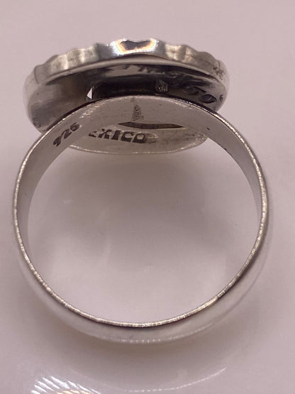 Anillo Espiral de Plata 925 con Ópalo de Fuego, sello de autenticidad Plata Ley .925
