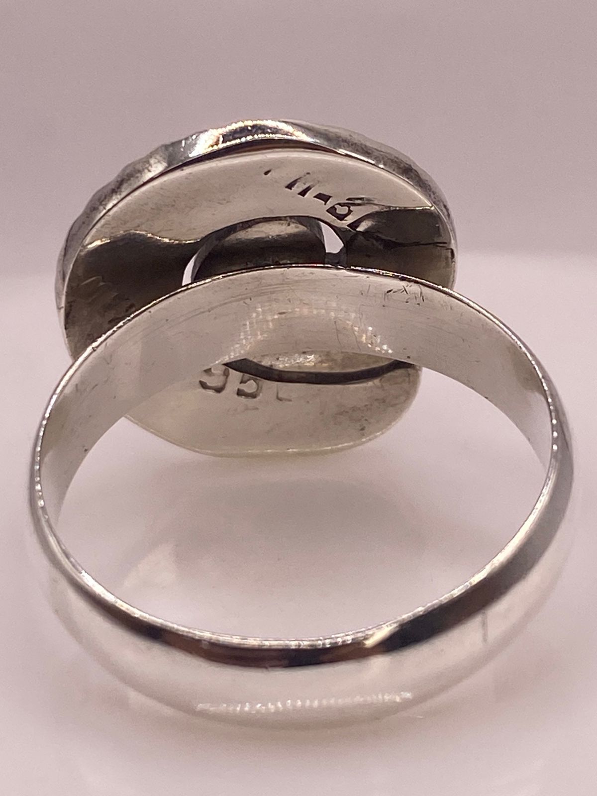 Anillo Espiral de Plata 950 con Ópalo de Fuego, sello de autenticidad Plata Ley .925