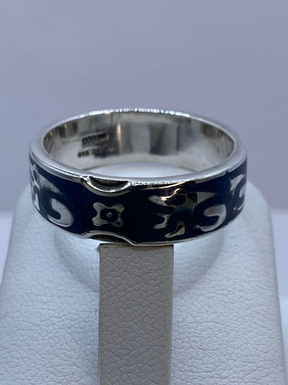 Anillo de Figura Orgánica en Turquesa y Plata .925, sello de autenticidad Plata Ley .925