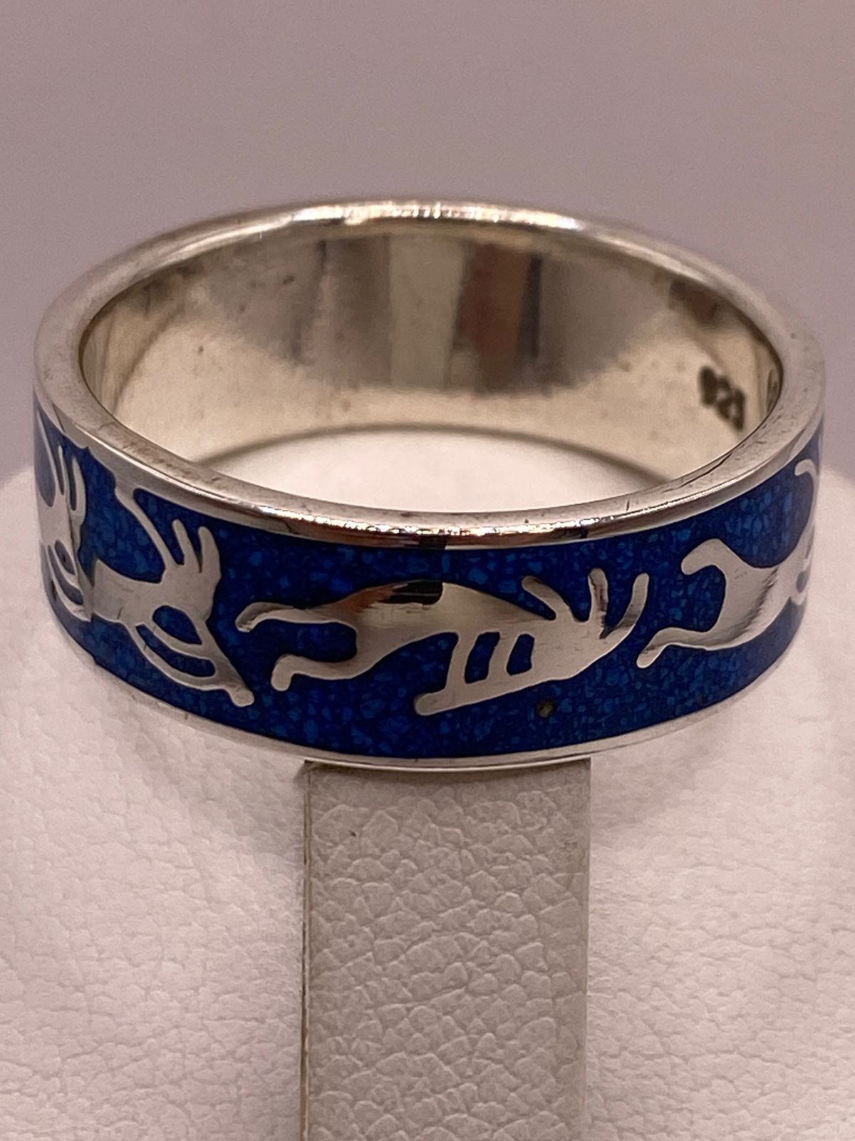 Anillo Figuras Zoomorfas con Piedra Azul Incrustada de Plata .925, sello de autenticidad Plata Ley .925