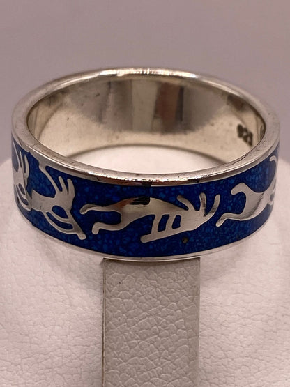 Anillo Figuras Zoomorfas con Piedra Azul Incrustada de Plata .925, sello de autenticidad Plata Ley .925