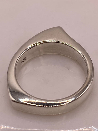 Anillo Geométrico Curvo en Plata .925, sello de autenticidad Plata Ley .925