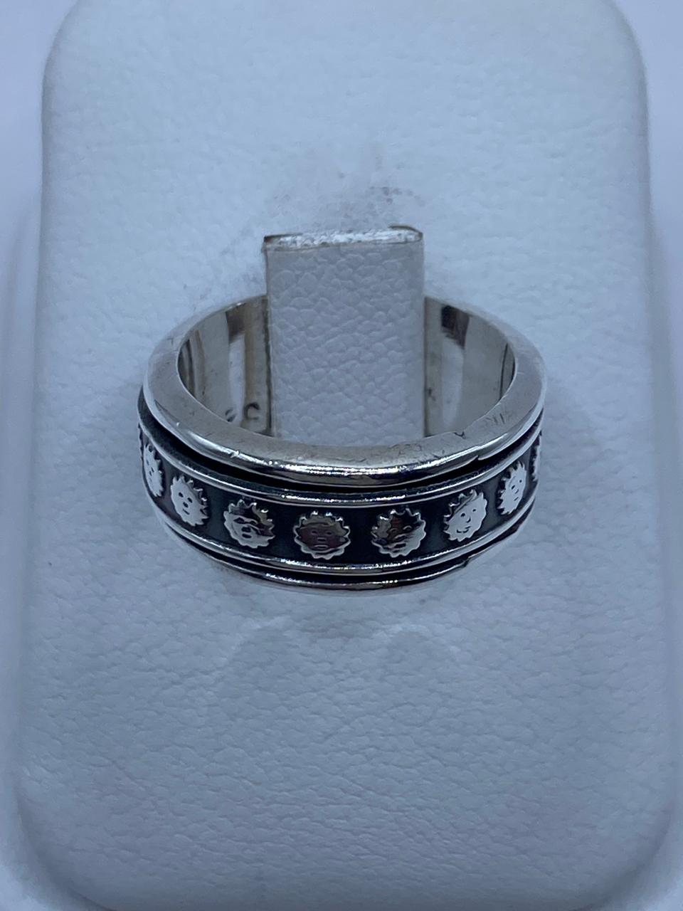 Anillo Giratorio de Plata 925 con Caritas de Sol — vista lateral