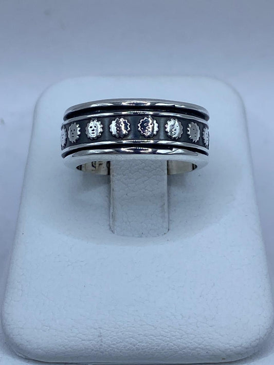 Anillo Giratorio de Plata 925 con Caritas de Sol, vista frontal