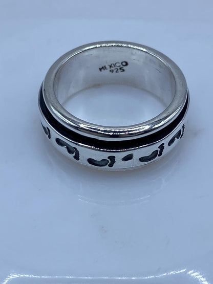 Anillo Giratorio de Plata 925 con Diseño de Huellas, sello de autenticidad Plata Ley .925