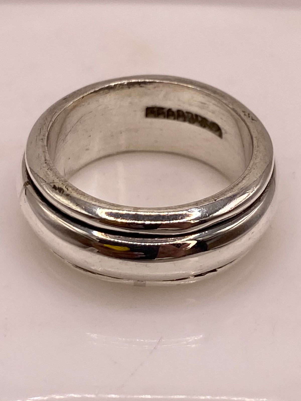 Anillo Giratorio Artesanal en Plata con Acabado Espejo, sello de autenticidad Plata Ley .925