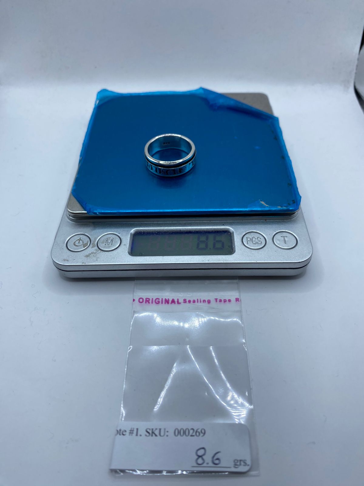Anillo Giratorio de Plata 925 con Símbolos de la Suerte, peso en gramos (báscula)