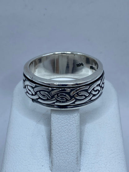 Anillo Giratorio de Plata 925 con Diseño Trenzado Celta – Fuerza y Eternidad , sello de autenticidad Plata Ley .925