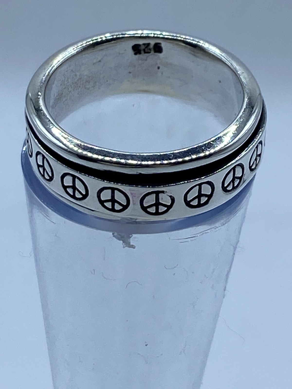 Anillo Giratorio de Plata 925 con Símbolos de Paz, vista frontal