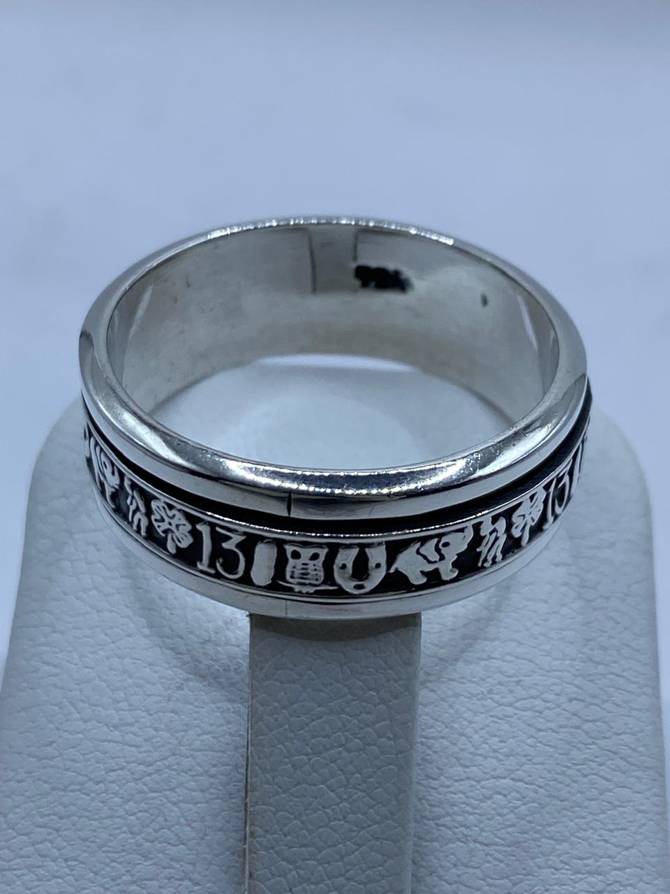 Anillo Giratorio de Plata .925 con Símbolos de la Suerte, sello de autenticidad Plata Ley .925