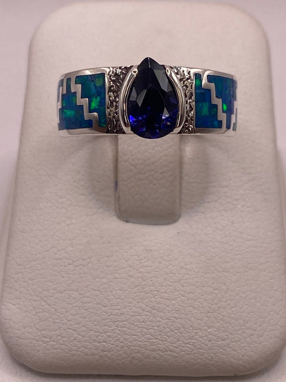 Anillo “greca Azul” de Plata 950 con Ópalo de Fuego y Zirconia, vista frontal