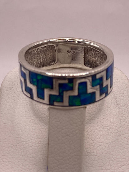Anillo Greca Geometrica Continua con Ópalo de Fuego en Plata .950, sello de autenticidad Plata Ley .925
