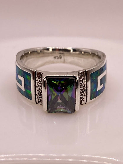 Anillo de Greca Geométrica con Ópalo de Fuego y Zirconia en Plata .950, sello de autenticidad Plata Ley .925