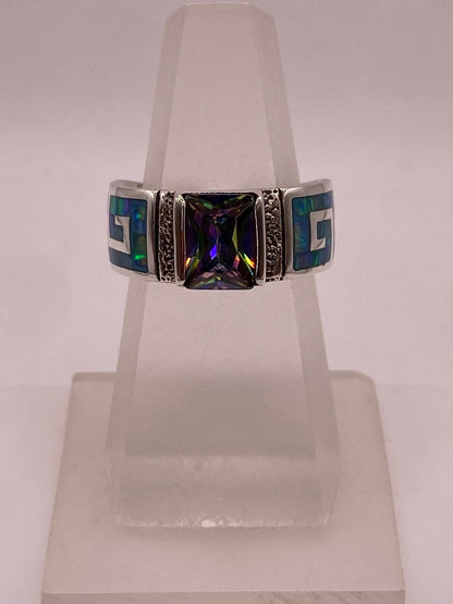 Anillo de Greca Geométrica con Ópalo de Fuego y Zirconia en Plata .950 en báscula mostrando peso