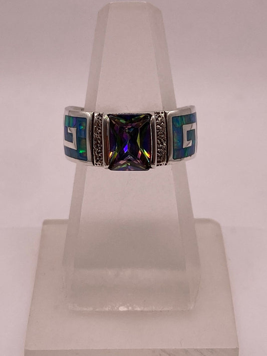 Anillo de Greca Geométrica con Ópalo de Fuego y Zirconia en Plata .950 en báscula mostrando peso