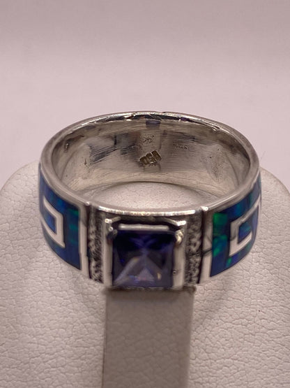 Anillo Greca Imperial de Plata 950 con Ópalo de Fuego y Zirconia, sello de autenticidad Plata Ley .925