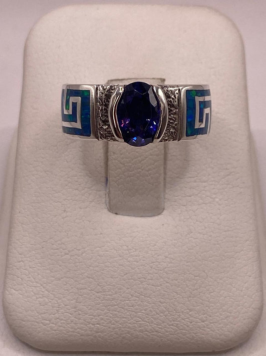 Anillo de Greca con Ópalo de Fuego y Zirconia en Plata .950 en báscula mostrando peso