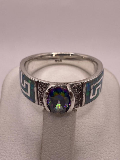 Anillo de Greca con Ópalo de Fuego y Zirconia en Plata .950, sello de autenticidad Plata Ley .925