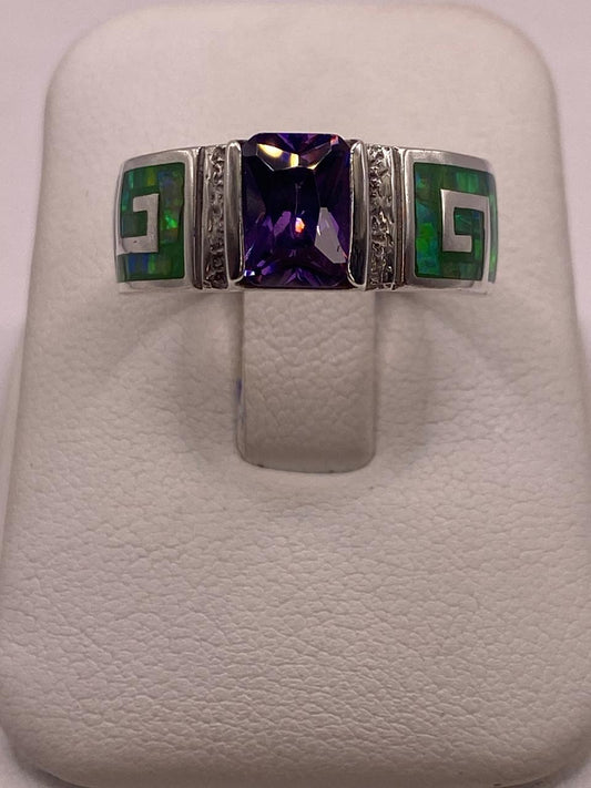 Anillo de Greca con Ópalo de Fuego y Zirconia en Plata .950 en báscula mostrando peso