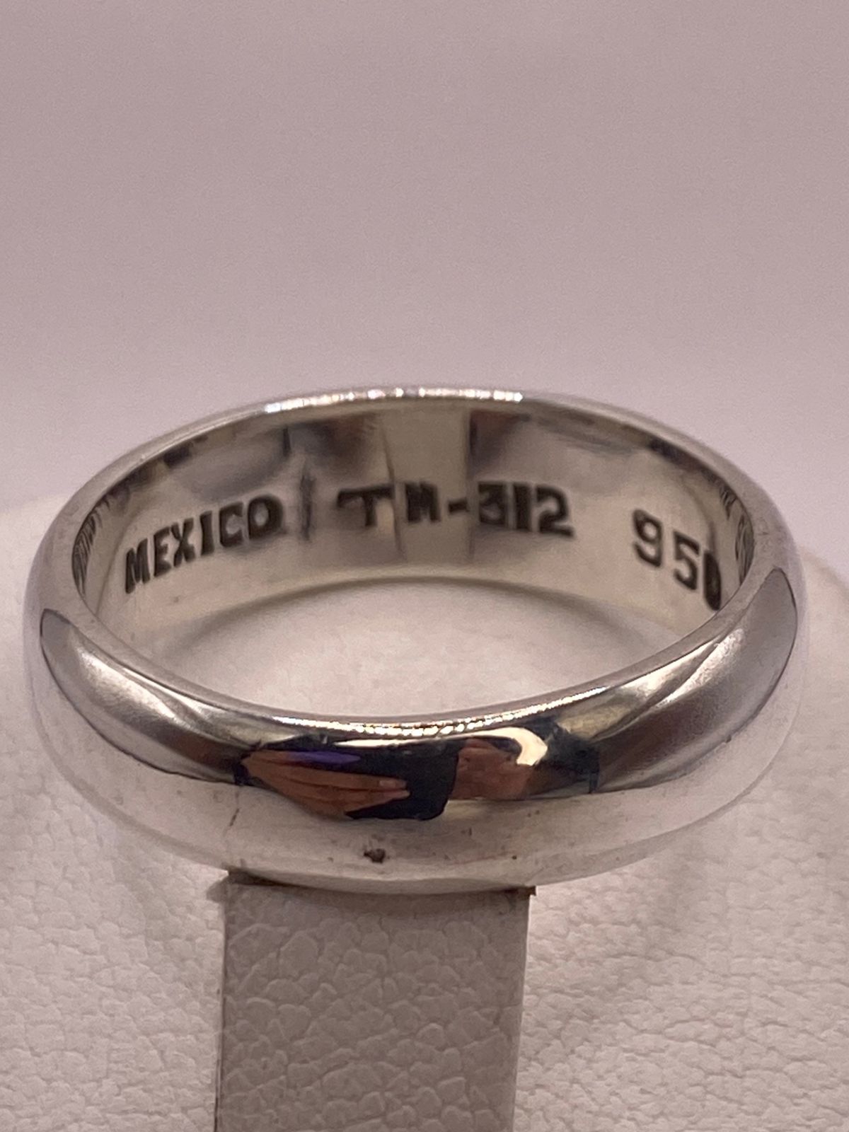 Anillo Greca de Plata 950 con Ópalo de Fuego, sello de autenticidad Plata Ley .925