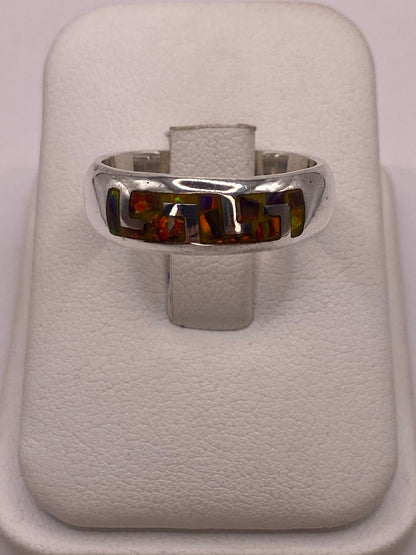 Anillo Greca de Plata 950 con Ópalo de Fuego — ángulo diagonal